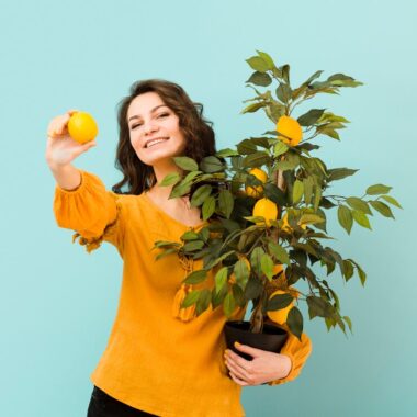 Beautiful woman holding tree 23 2148482993